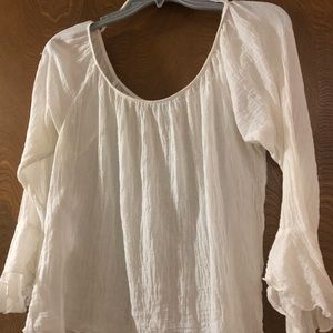 Cream color off /on shoulder blouse size large.
